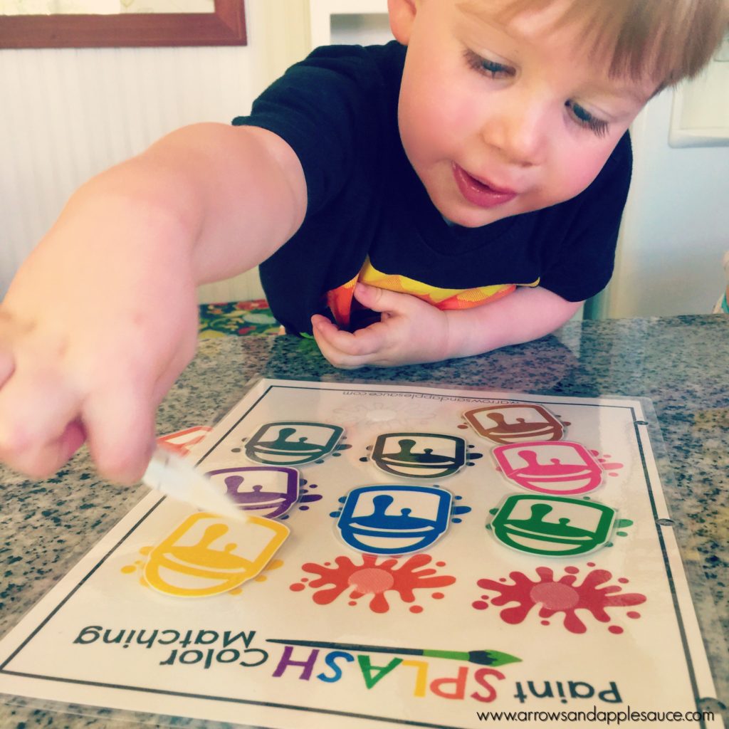 Teaching your little ones their colors is fun and easy with these printable games. Enjoy a paint splash themed matching game and a free color hunt wheel! #learningcolors #preschool #colorwheel #colorhunt #paintsplash #homeschool