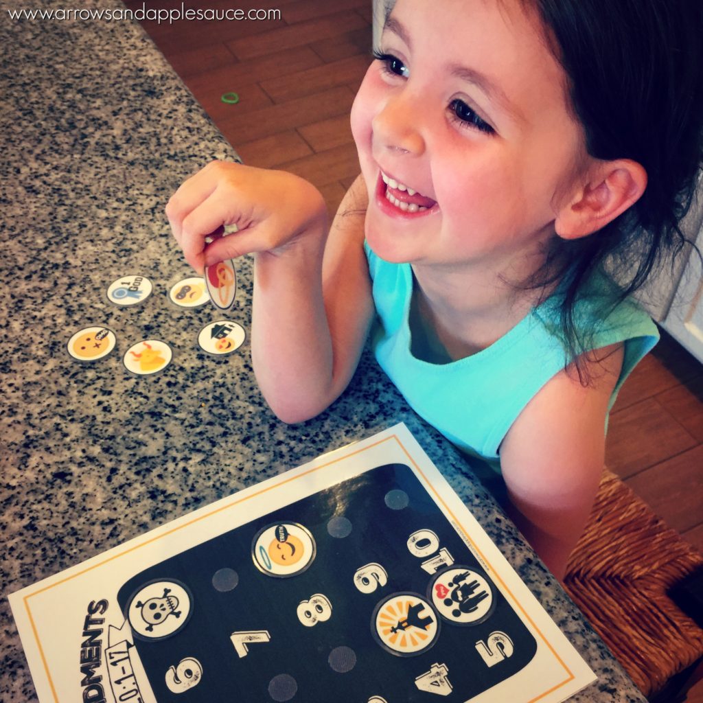 Helping your kiddos learn and remember the Ten Commandments is easy and fun with this printable memory game. Read on to learn how I helped our four year old grasp these big concepts. #tencommandments #Bibleforkids #Bibleverse #faith #homechool #preschool #educationalgames #printables