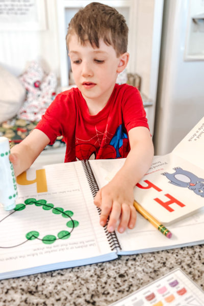 Starting preschool at home can be overwhelming. Here are my top five tips to keep it simple and fun for you and your little learner! #preschoolathome #homeschoolpreschool #preschool #preschoolresources #howtoteachpreschool