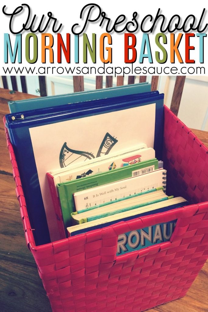 We're making school a little cozier by starting our day with our preschool morning basket. See how we're incorporating reading, singing, and daily learning into one easy to use basket. And staying in our pjs while we do it! #morningbasket #morningroutine #preschoolathome #kidsactivities #hymnswithkids #circletime #homeschool #calendartime #hyggehomeschool