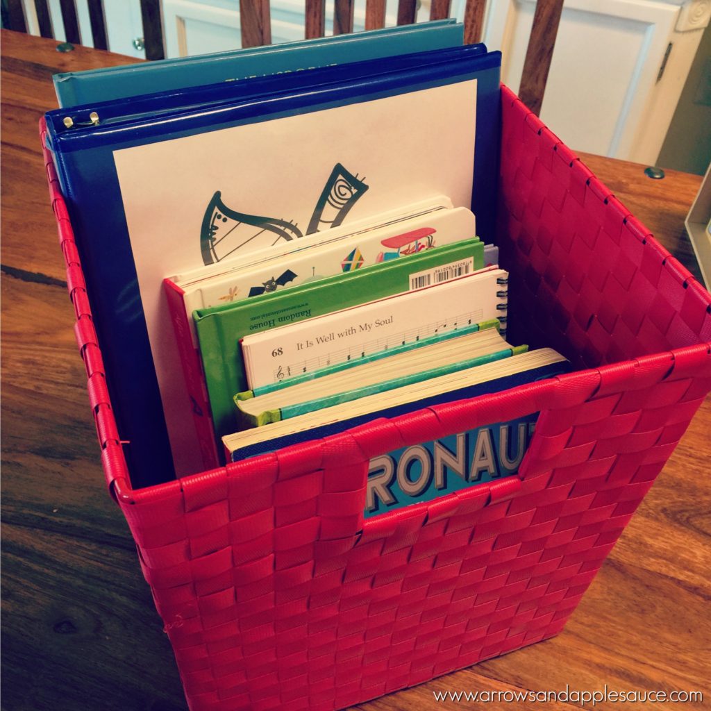 We're making school a little cozier by starting our day with our preschool morning basket. See how we're incorporating reading, singing, and daily learning into one easy to use basket. And staying in our pjs while we do it! #morningbasket #morningroutine #preschoolathome #kidsactivities #hymnswithkids #circletime #homeschool #calendartime #hyggehomeschool
