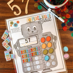 Learning about place value was a big hurdle. This cute and easy to use printable place value robot made it easy to understand and fun! #placevalue #homeschoolmath #Kindergarten #kindergartenmath #robotactivity #homeeducation #mathgame