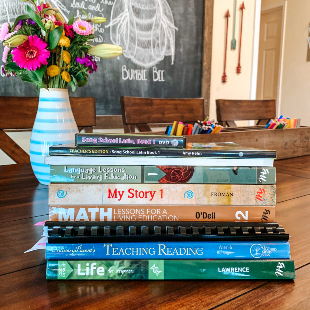 I'm excited to share our first grade homeschool curriculum picks with you for our upcoming homeschool year! #homeschoolcurriculum #firstgrade #homeeducation #teachingkidsathome #Christianhomeschool #firstgrademath #firstgradelanguagearts #firstgradescience #kidsnaturestudy #exploringnaturewithchildren #latinforkids