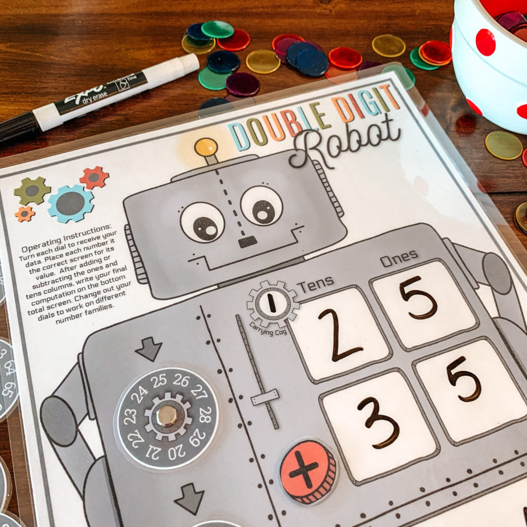We loving using our Double Digit Robot for addition and subtraction practice! He's perfect for independent math lessons and review! #firstgrademath #doubledigitadding #subtractionpractice #homeschoolprintable #homeeducation #handsonmath #mathmanipulatives #robotmath