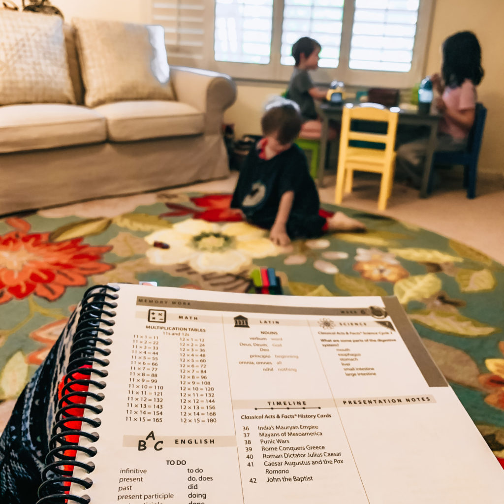 We're making Classical Conversations work for us at home without a community day. Here's how we made adjustments to fit our family! #classicalconversations #classicaleducation #homeschool #homeschoolroutine #homeeducation #homeschoollifestyle #learningathome #classical #firstgradeathome #homeschoolfirstgrade