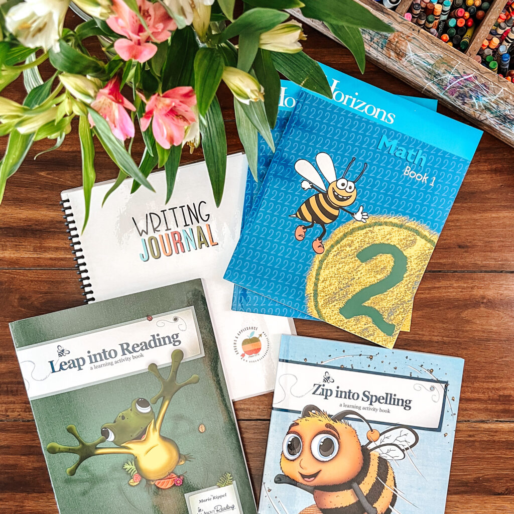 In this post, I'm sharing our first, second, and fourth grade curriculum picks for our 2023-2024 homeschool year! Come take a look! #homeschool curriculum #firstgrade #secondgrade #fourthgrade #homeschoolmath #elementarylanguagearts #allaboutreading #firstlanguagelessons