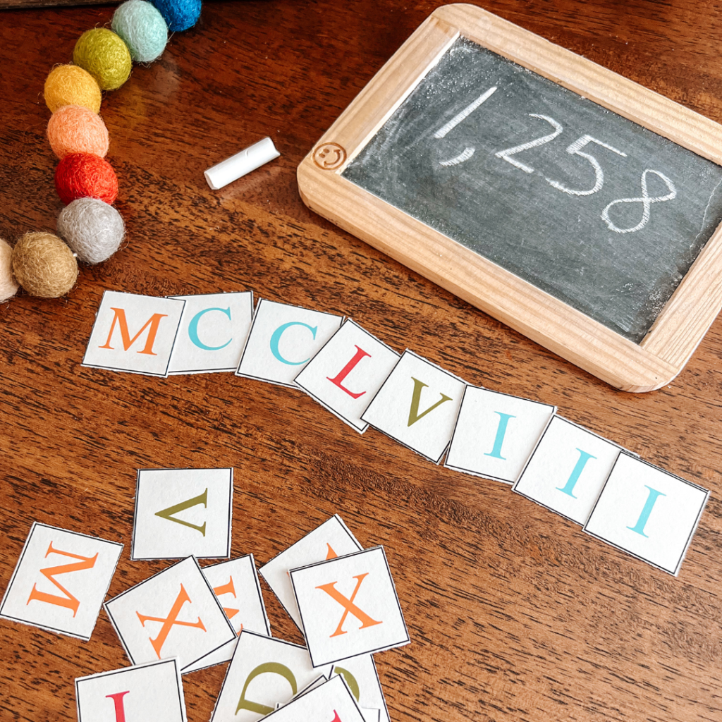 Introduce your kids to the fun of learning Roman numerals with our hands-on activity set! Perfect for homeschool moms, this set includes charts, matching games, and Bingo to make learning engaging. Boost math skills, critical thinking, and cultural awareness with these exciting activities. #RomanNumerals #HomeschoolMath #HandsOnLearning #ElementaryMath #MathGames #HomeschoolResources #EducationalActivities #mathprintables #fourthgrade #fifthgrade